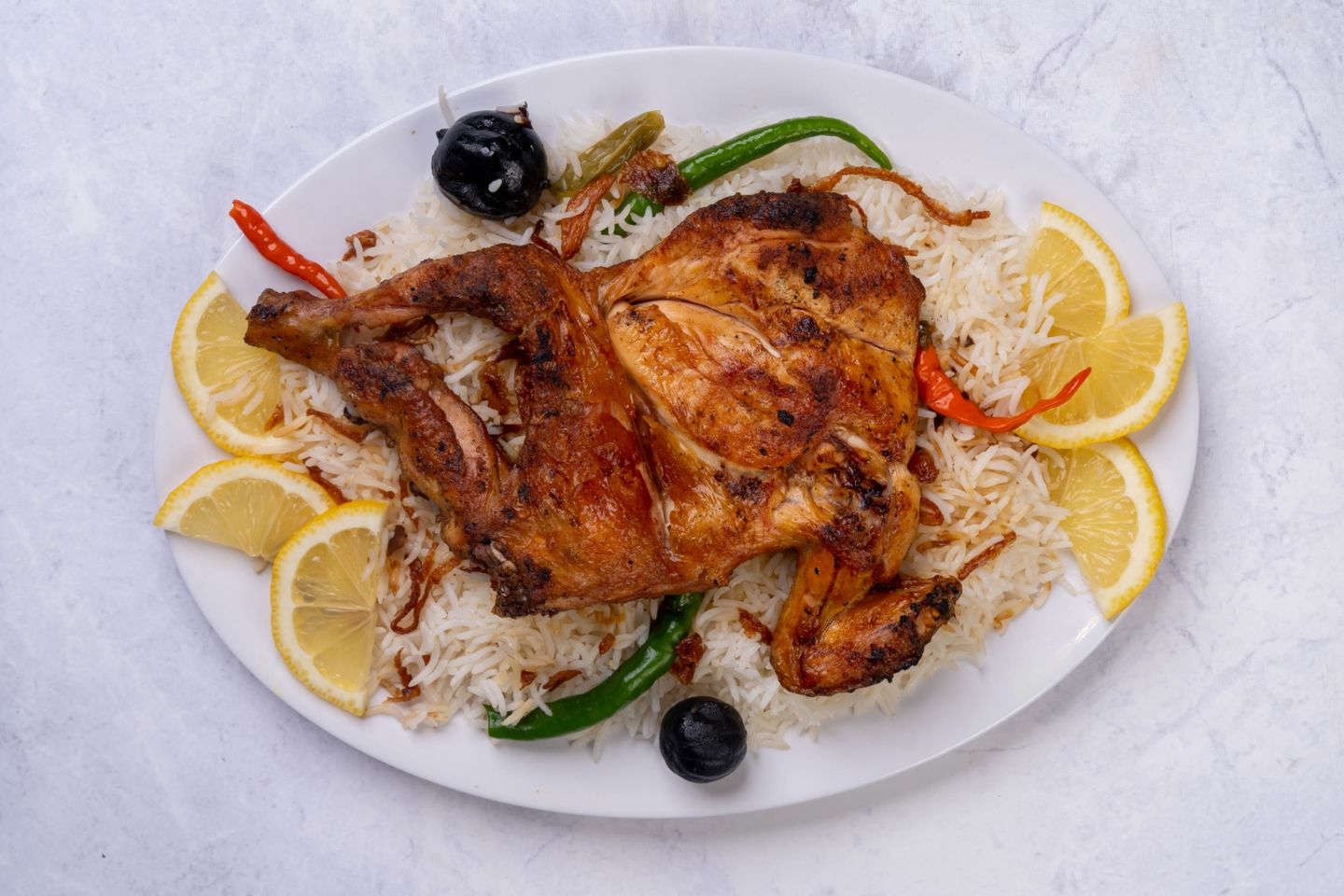Half Chicken Madbi - Bishawur Rice