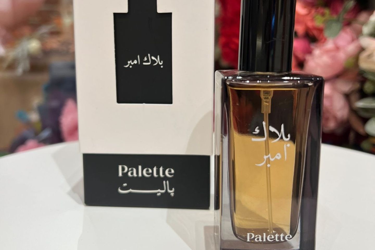 عطر بلاك أمبر من باليت للرجال - أريد العطر مع تغليف وورد