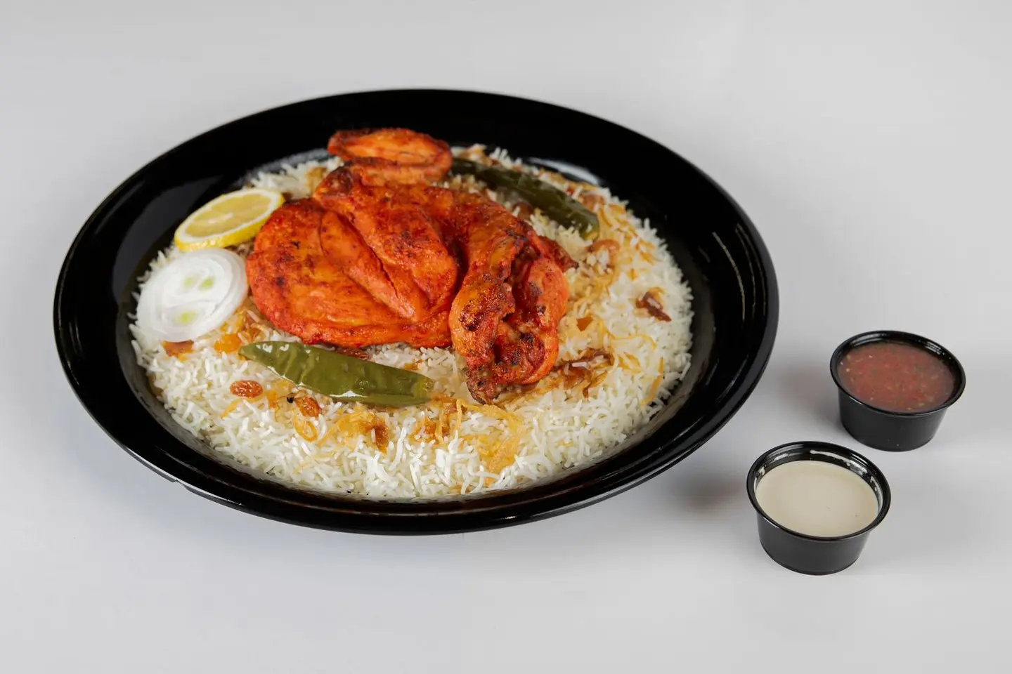 مظبي حراق مع أرز بشاور - نصف دجاجة
