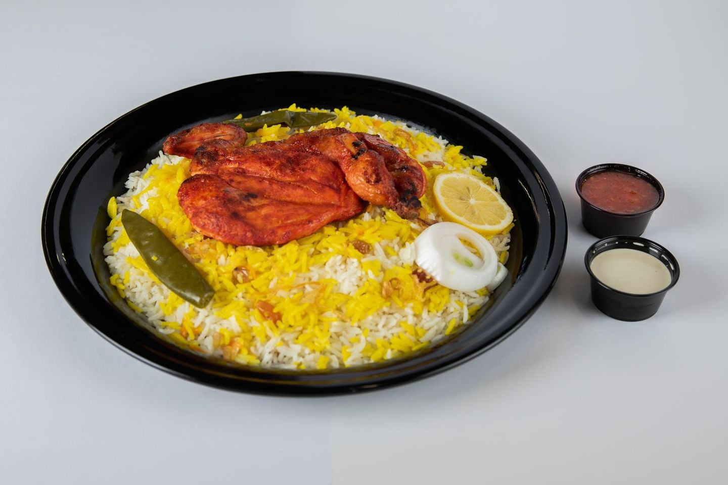Spicy Madhbi With Popular Rice - Half A Chicken