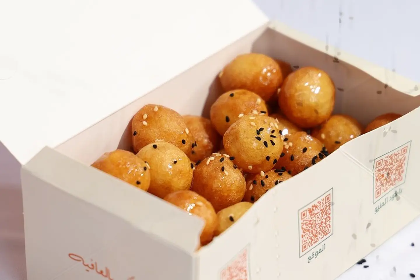 لقيمات حبة سوداء مع سمسم وشيرة - صغير