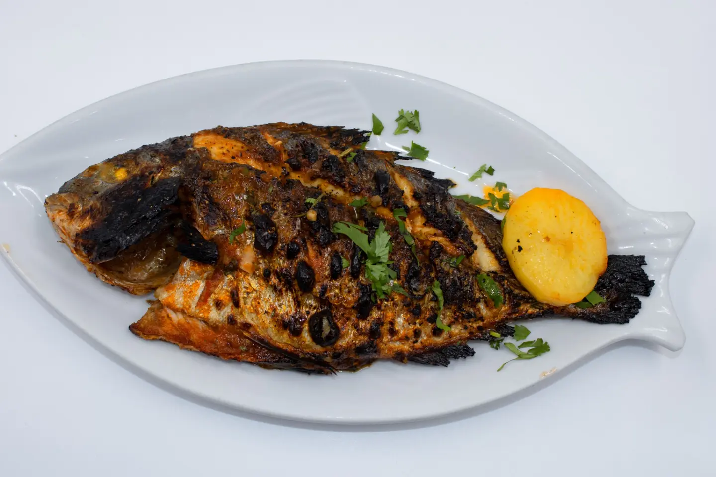 دنيس مشوي زيت وليمون - دنيس مشوي زيت وليمون-نصف