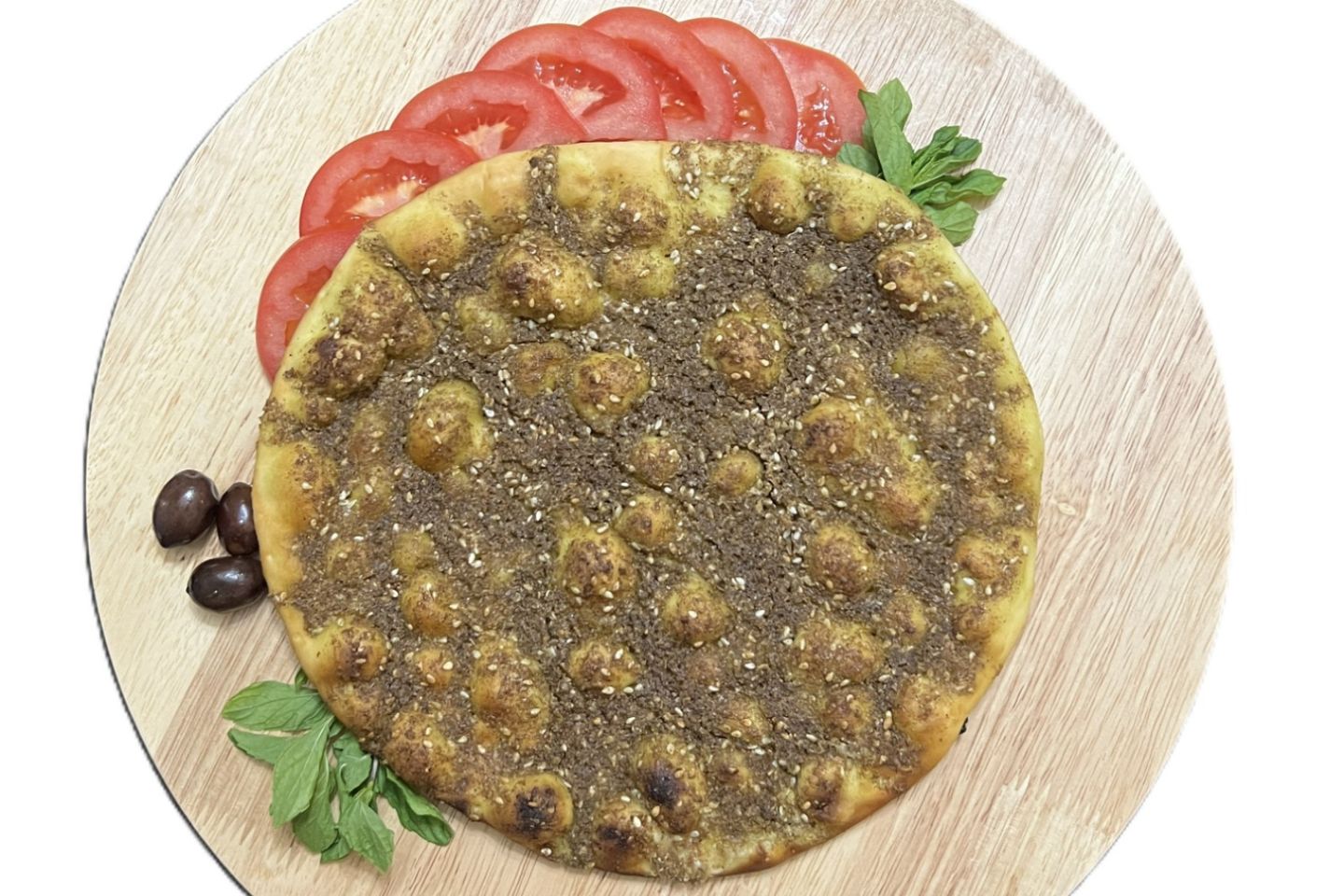 مناقيش زعتر - مشروحة