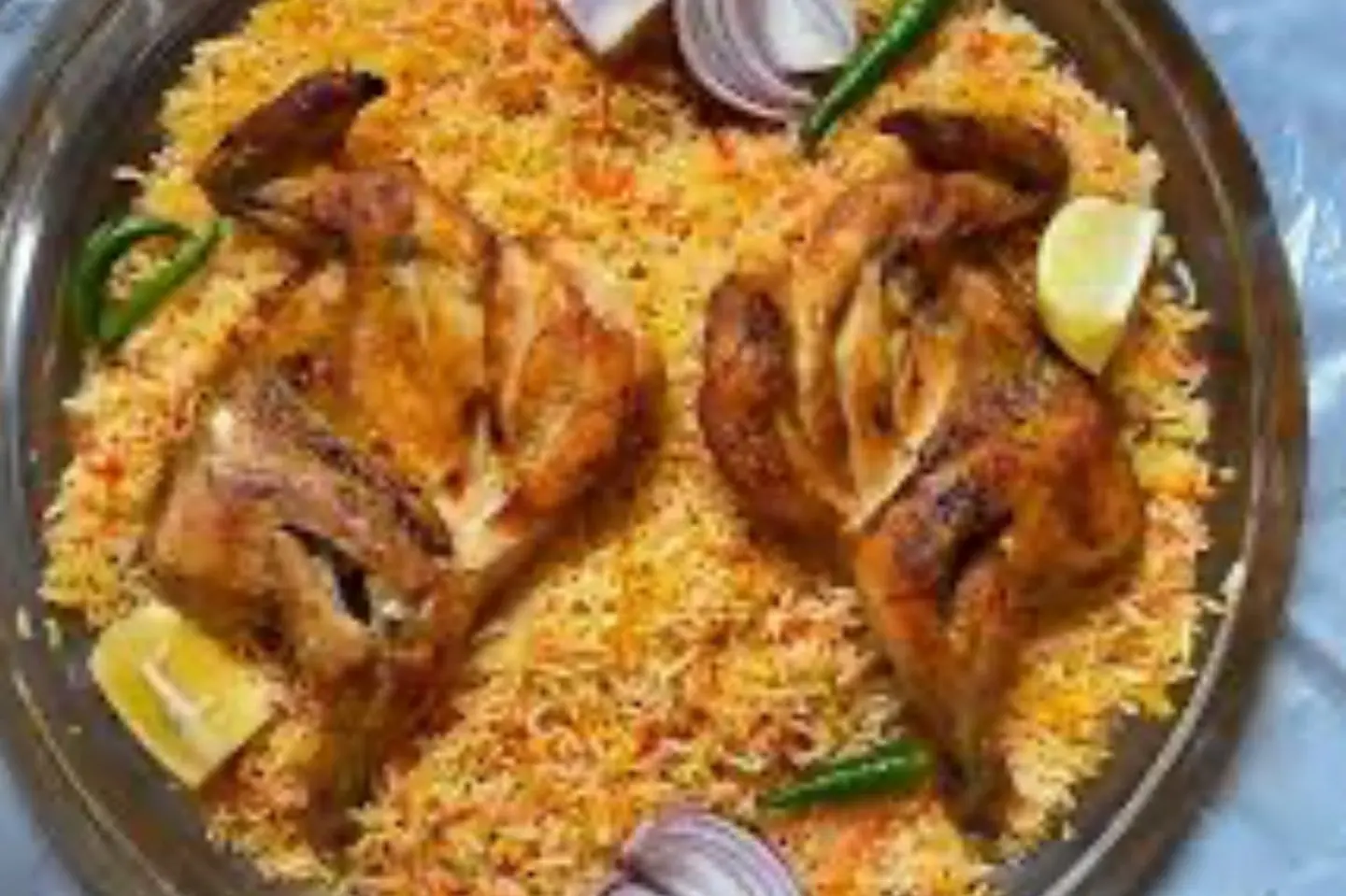 دجاج مظبي مع ارز مندي - نصف حبة