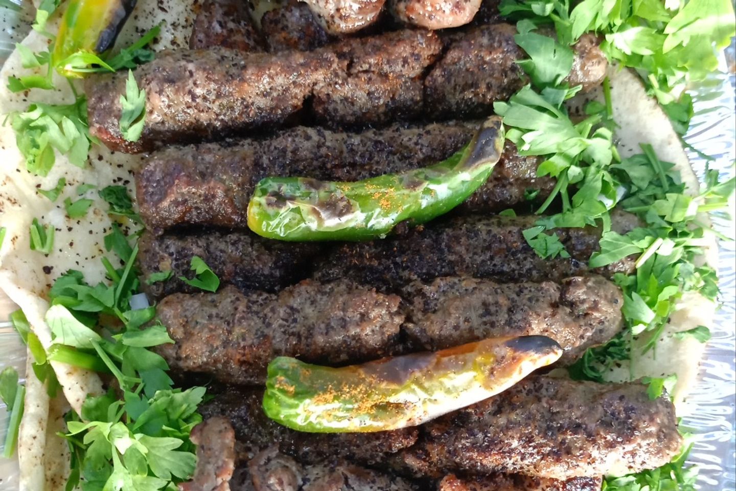 Mixed Grills For 4 People Half Kg With Smoky Onion's Tomatoes And Green Chillies  - Spicy