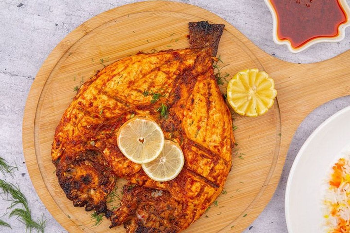 سمك قاروص مشوي - مع أرز انيض