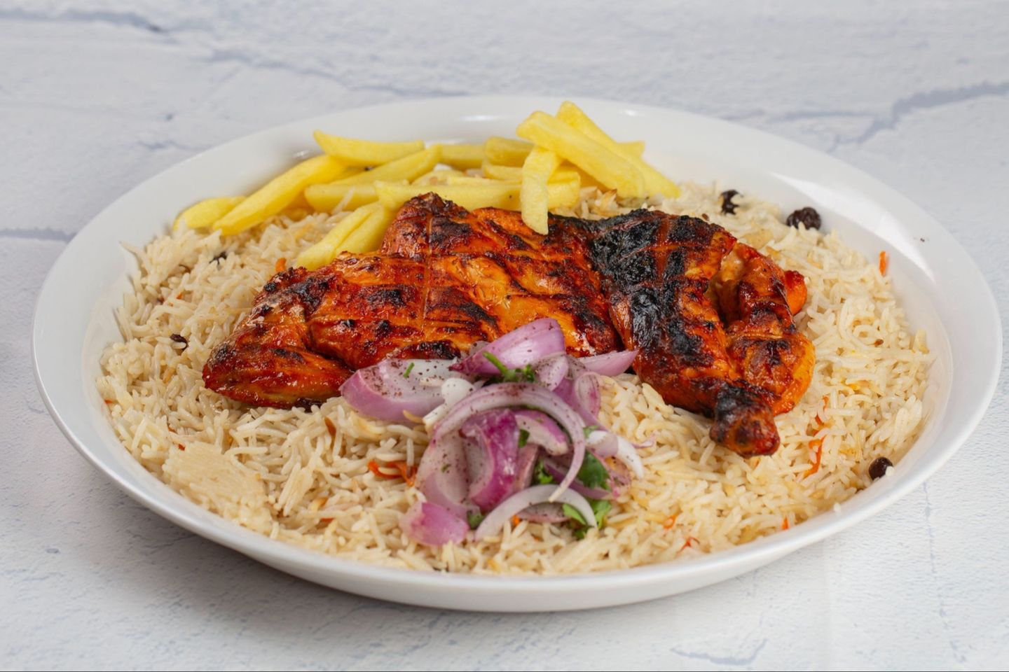 دجاج على الفحم مع الرز - نص دجاجة