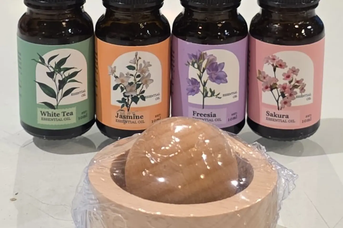 كرة الفواحة العطرية الخشبية - شاي أبيض