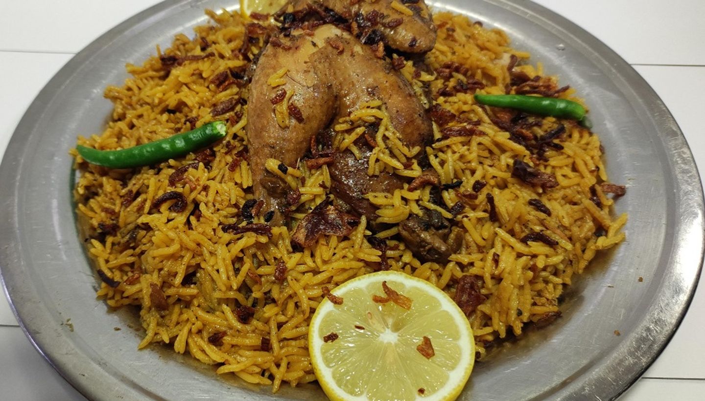 دجاج مضغوط مع الأرز - نص حبة دجاج