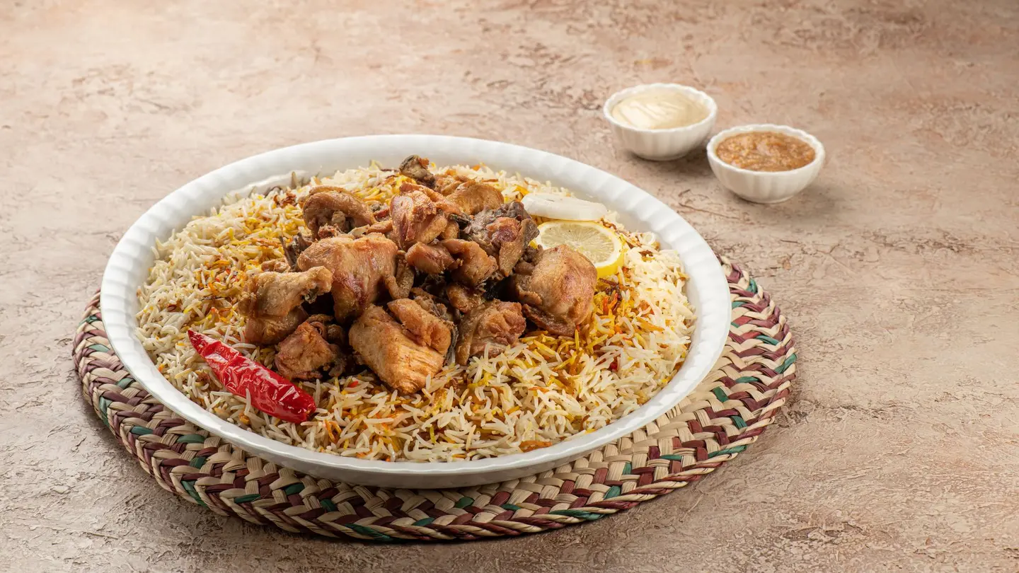 دجاج مقلقل مع أرز - نصف حبة دجاج