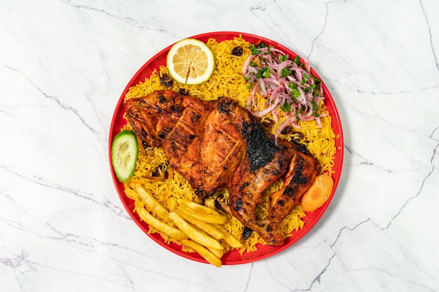 دجاج عالفحم مع الأرز - نص دجاج