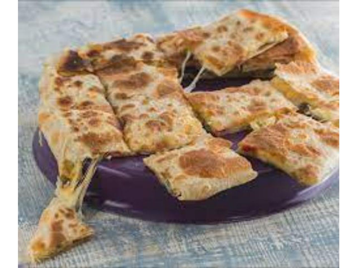 فطيرة طايرة لحوم مشكل - وسط