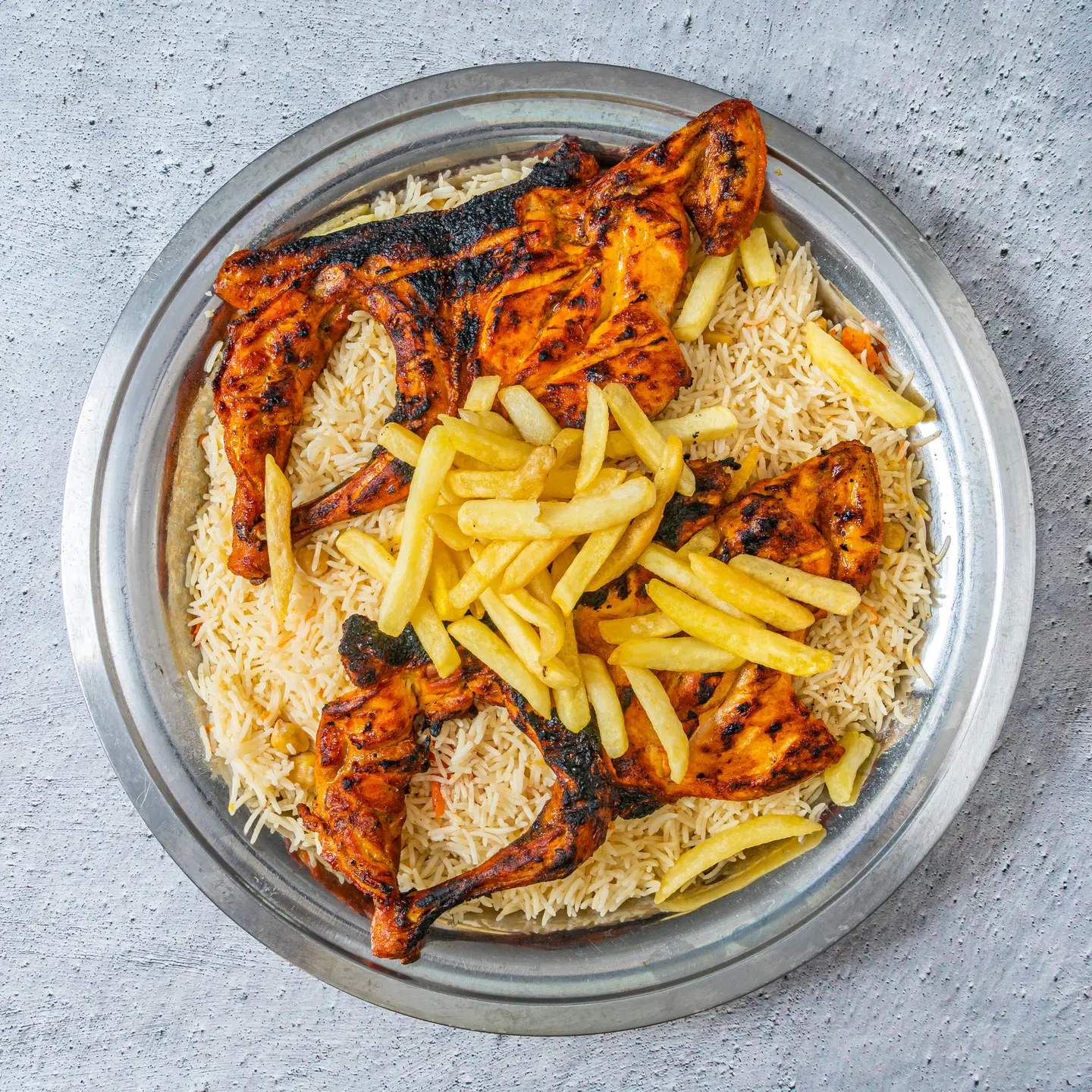 دجاج على الفحم مع الرز - نص حبة دجاج مع رز