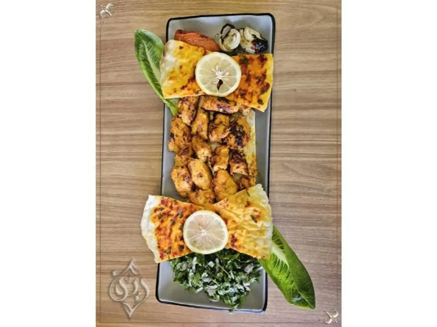 أوصال دجاج شيش طاووق - طبق