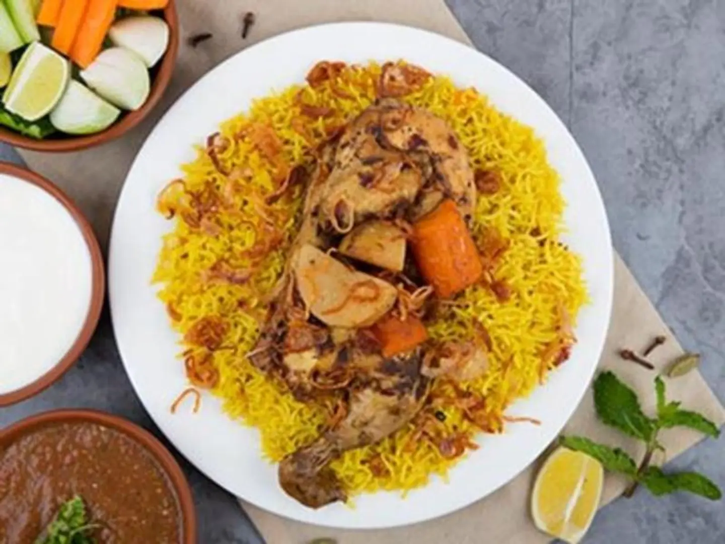 نصف دجاج مدفون - مع الأرز