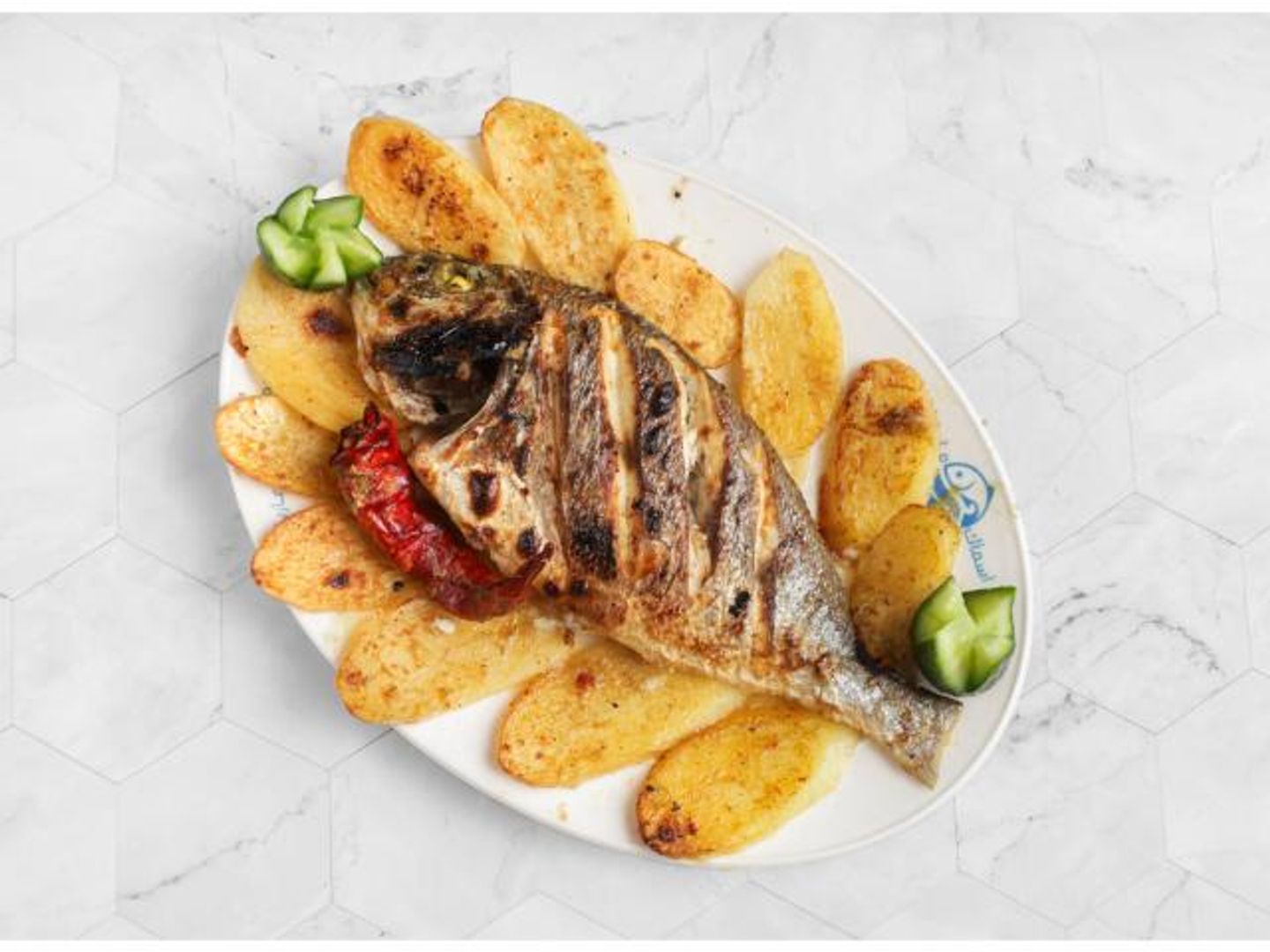 Sea Bream With Oil, Lemon And Potatoes - 400 Grams