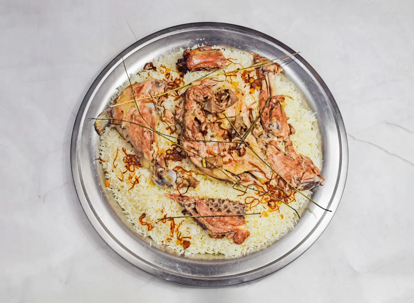 نصف تيس مظبي مع أرز حنيذ - أرز حنيذ