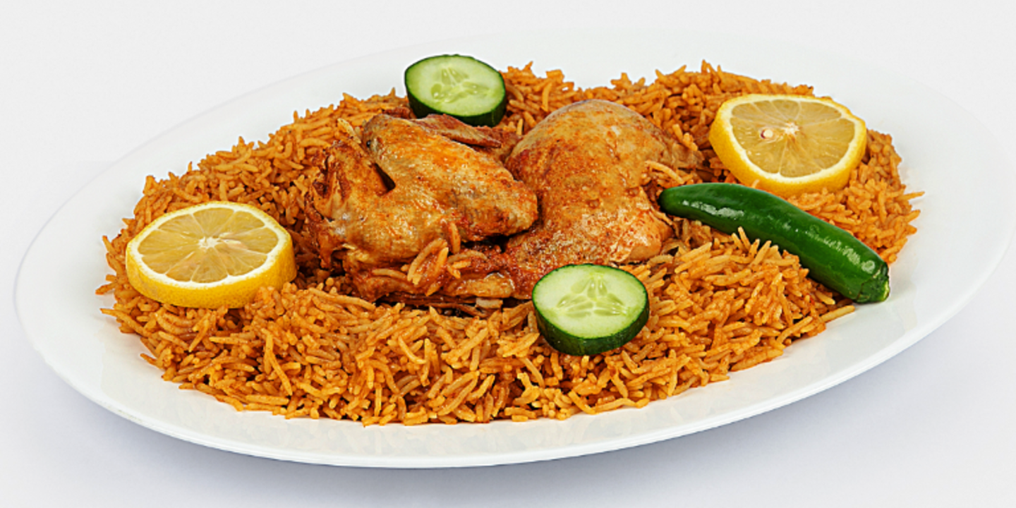 دجاج مضغوط - نصف حبة مع الرز