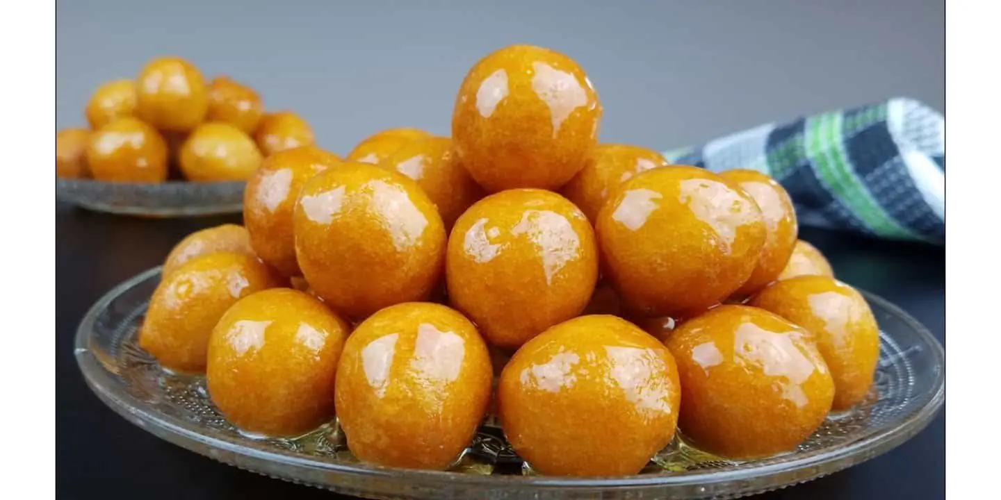 Luqaimat And Mawaleh Al Sanaa cover