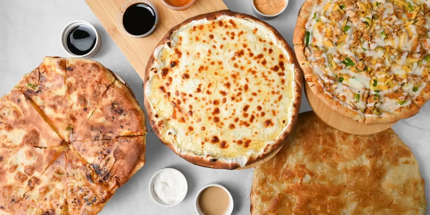 مطعم مشلتت وبيتزا cover