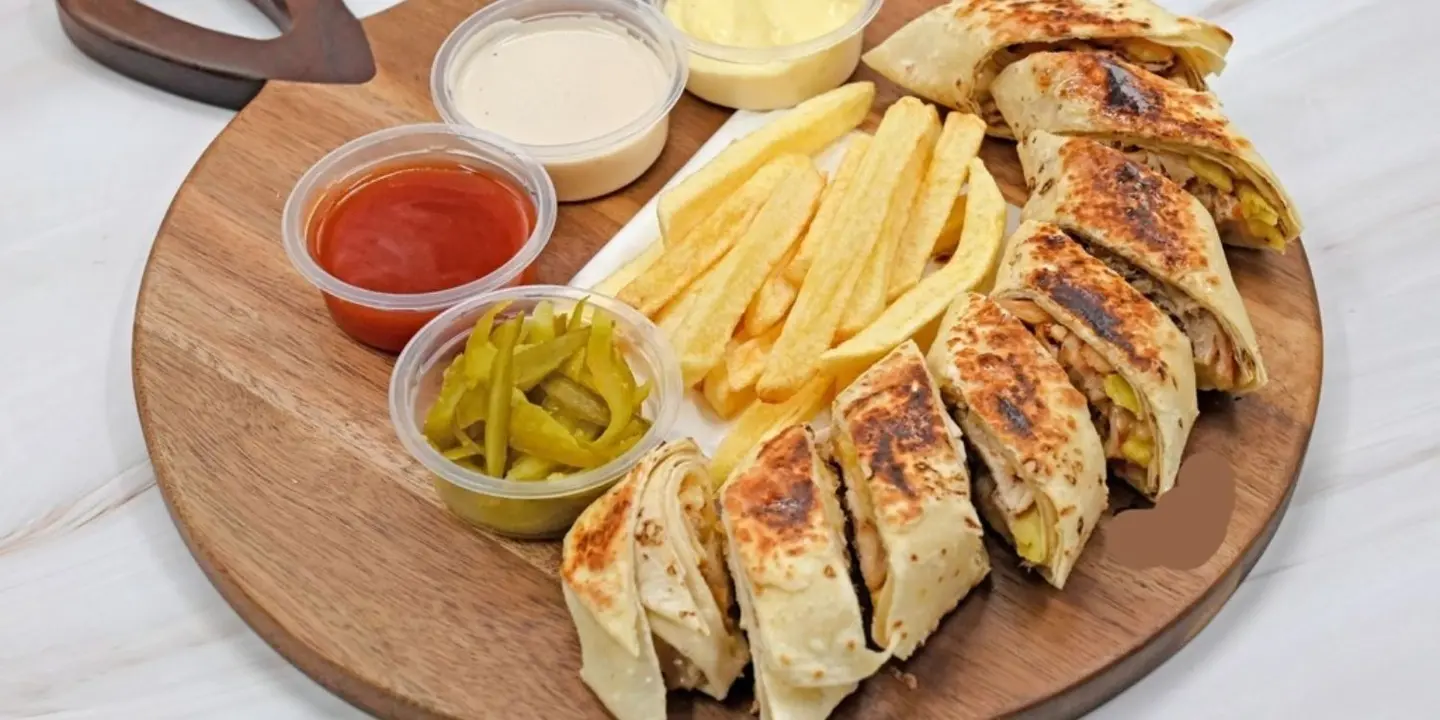 The taste of shawarma on charcoal cover