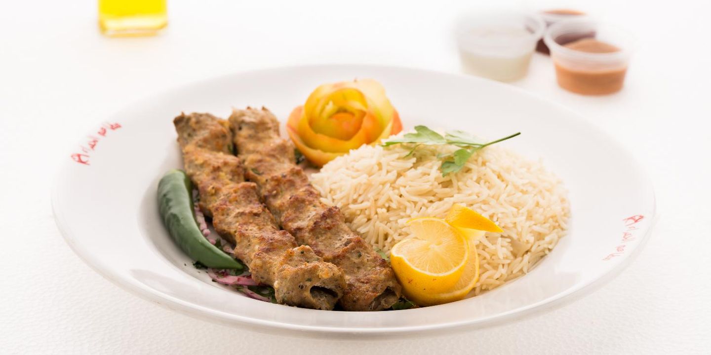 مطاعم مشويات الحمراء cover