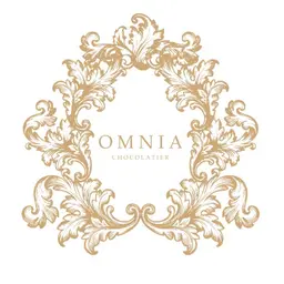 OMNIA CHOCOLATIER logo