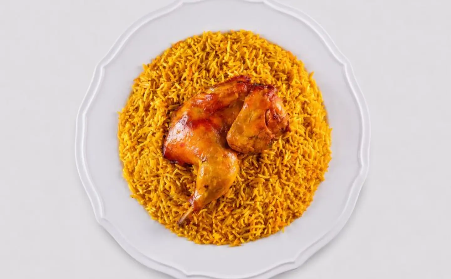 نص دجاج مندي مع رز برياني