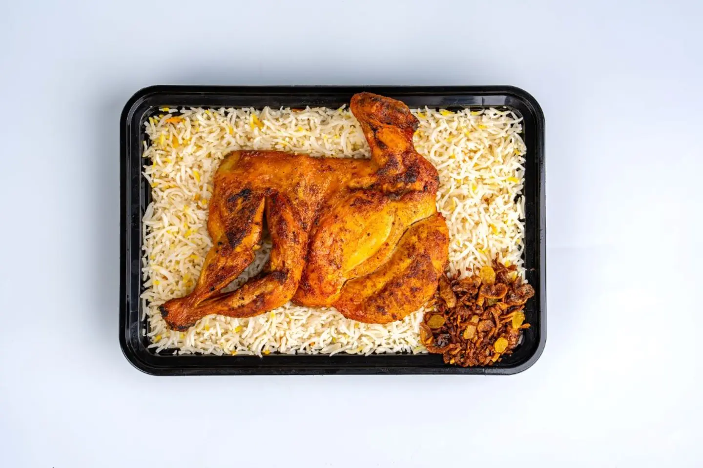 نص دجاج مظبي مع رز مبهر