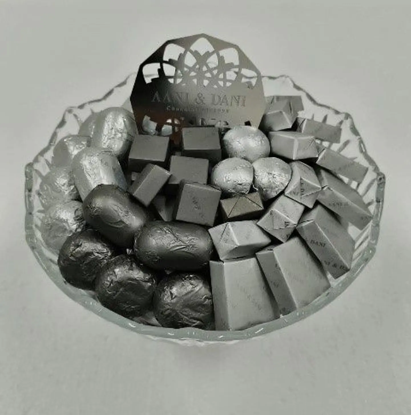 طبق زجاجي صغير مستدير فضي