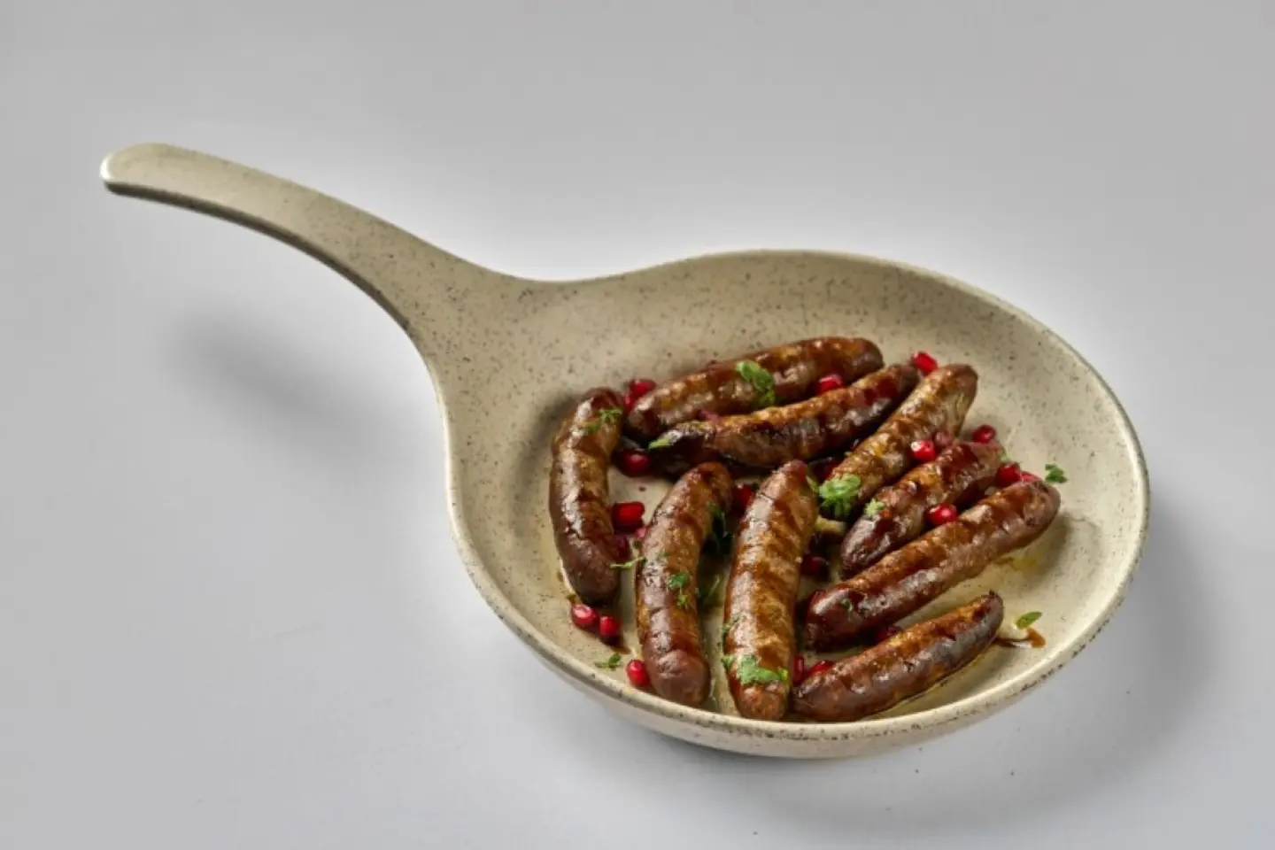 Arabic Sausages With Pomegranate Molasses