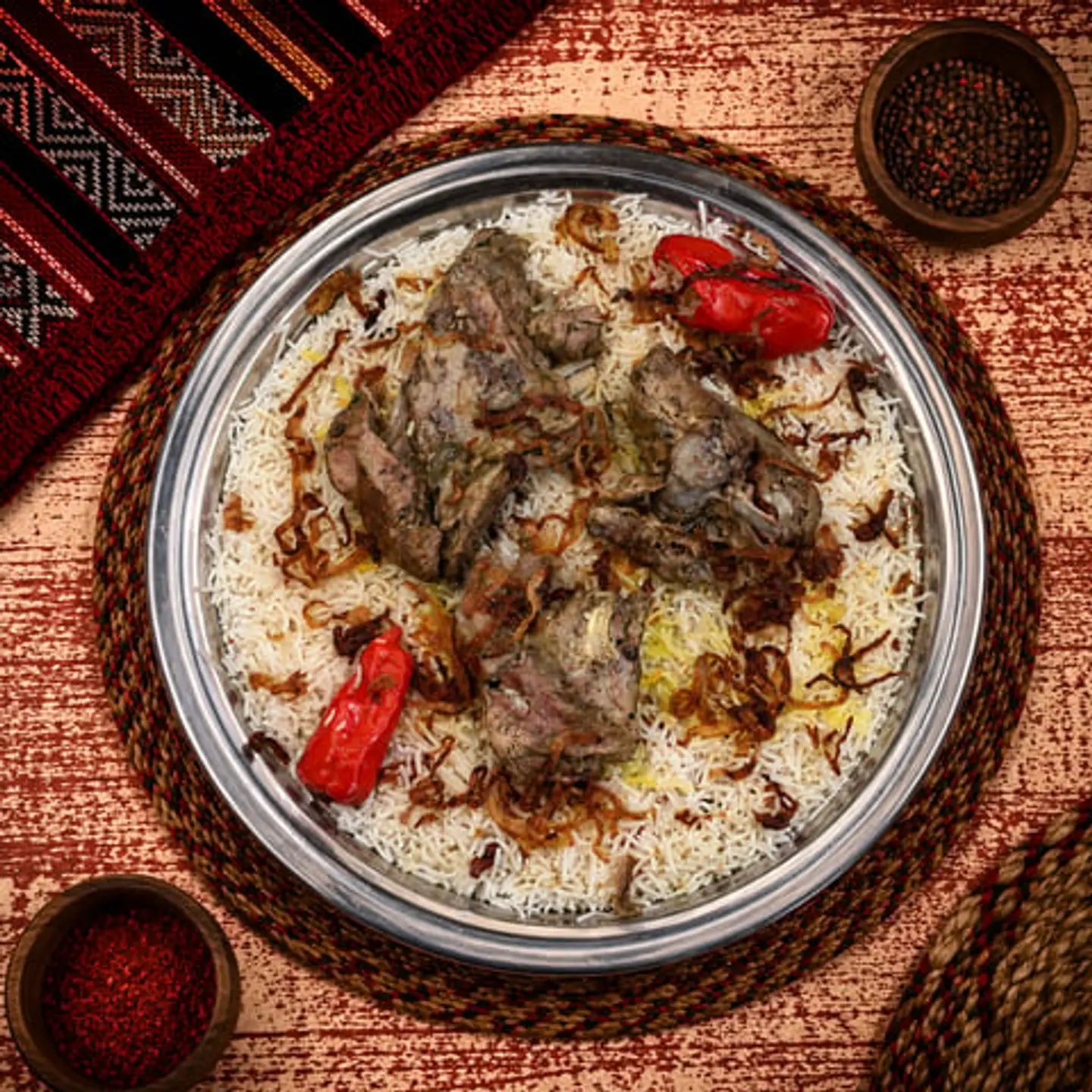 نفر لحم حنيذ بالمرخ