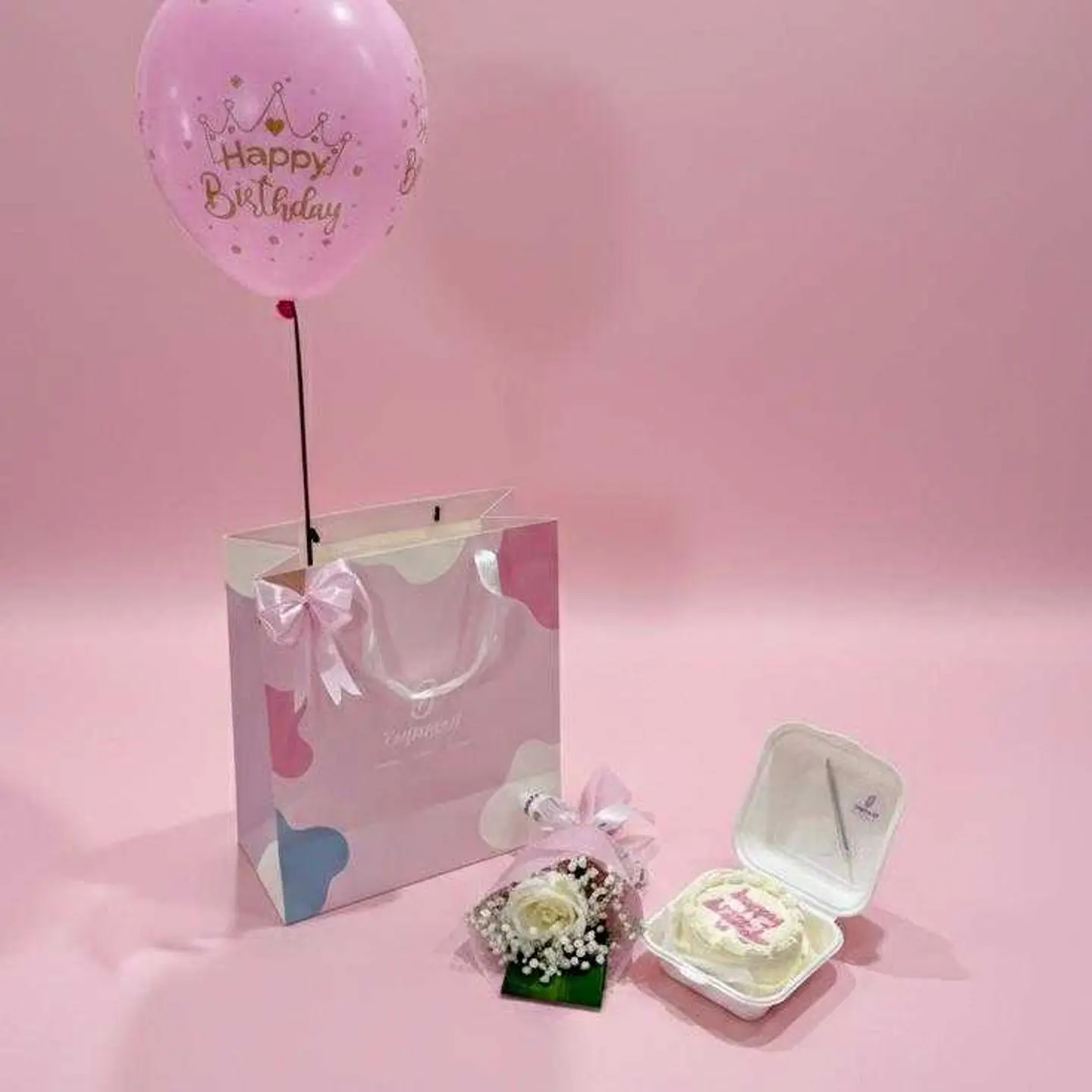 Lunch Package, A Flower, And A Balloon