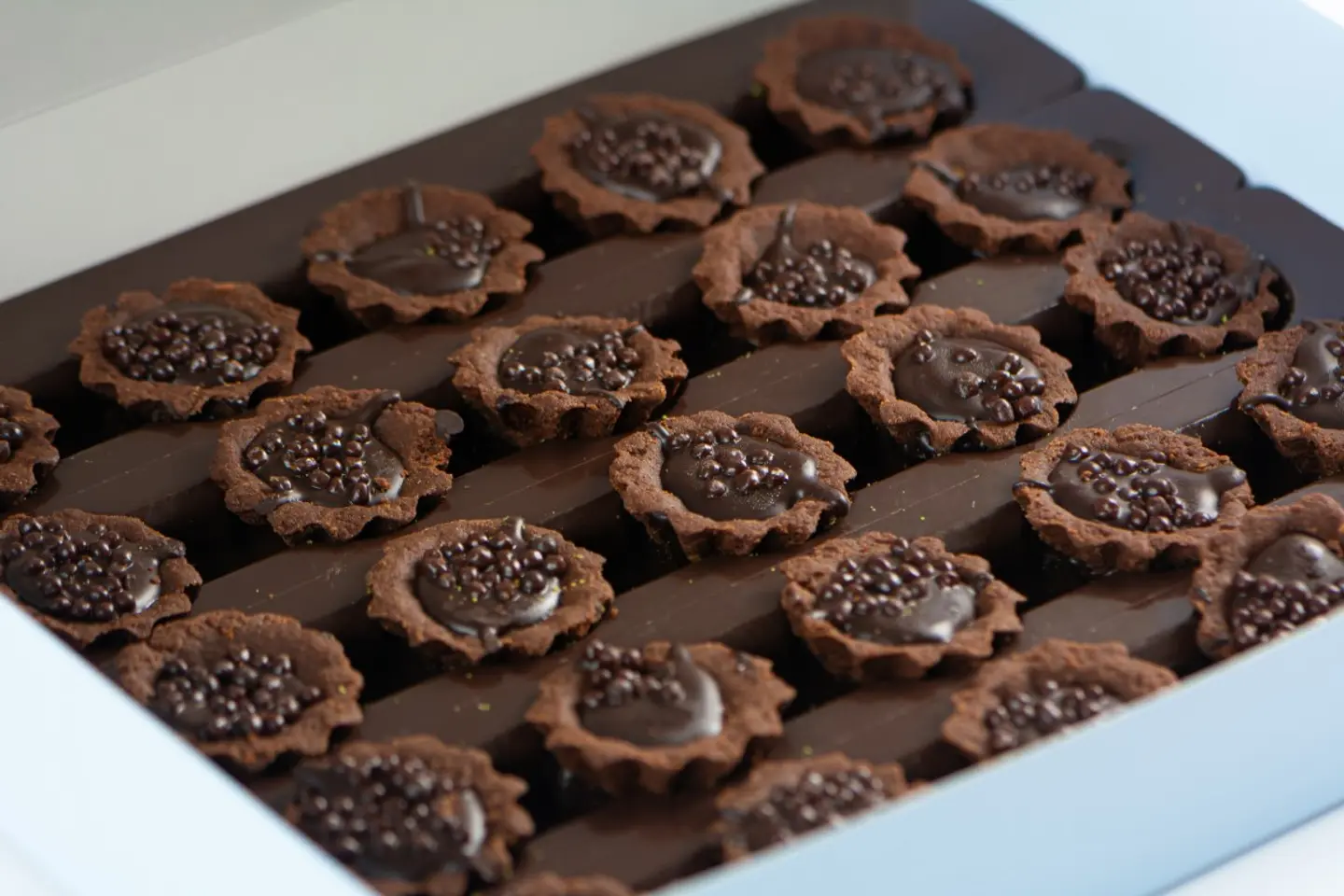 Mini Tart With Chocolate Cream Covered With Crunch Chocolate