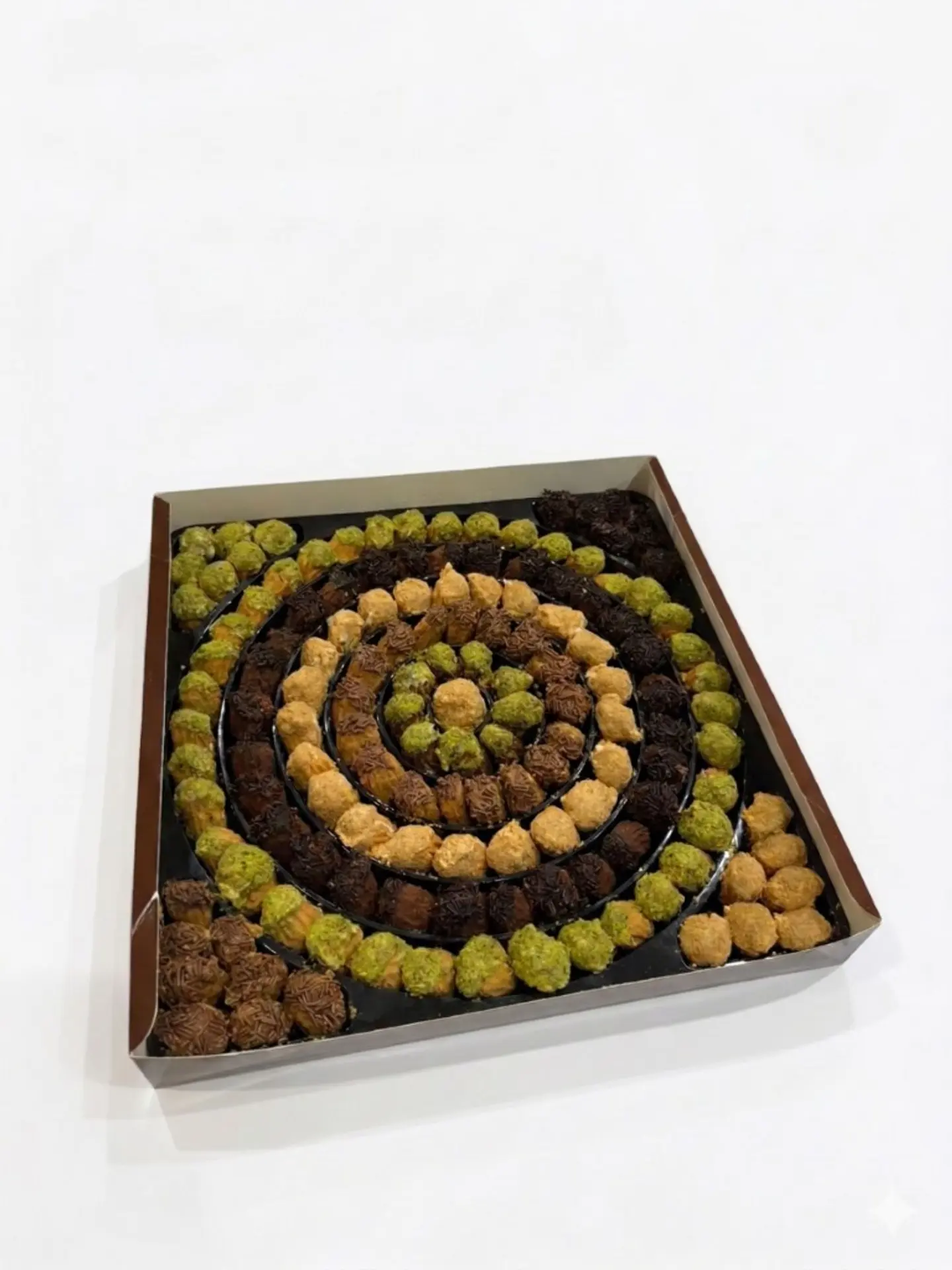 Sweet Crispy Petit Fours With Assorted Sprinkles And Pistachios Round