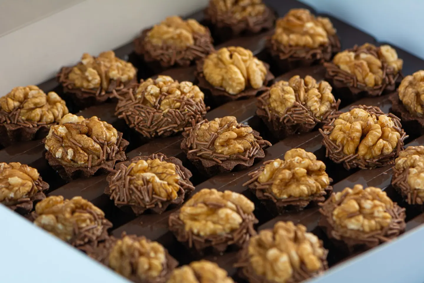 Mini Tart Stuffed With Dates Covered With Walnuts