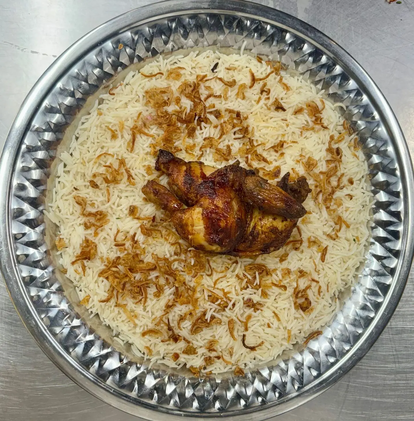 Half A Grilled Chicken With White Rice