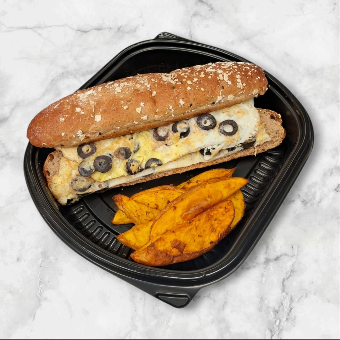 Olive Omelet With Potato Wedges