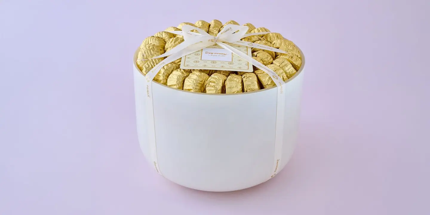 A Vase Of Date Filled Cookies In A Luxurious Wrapper