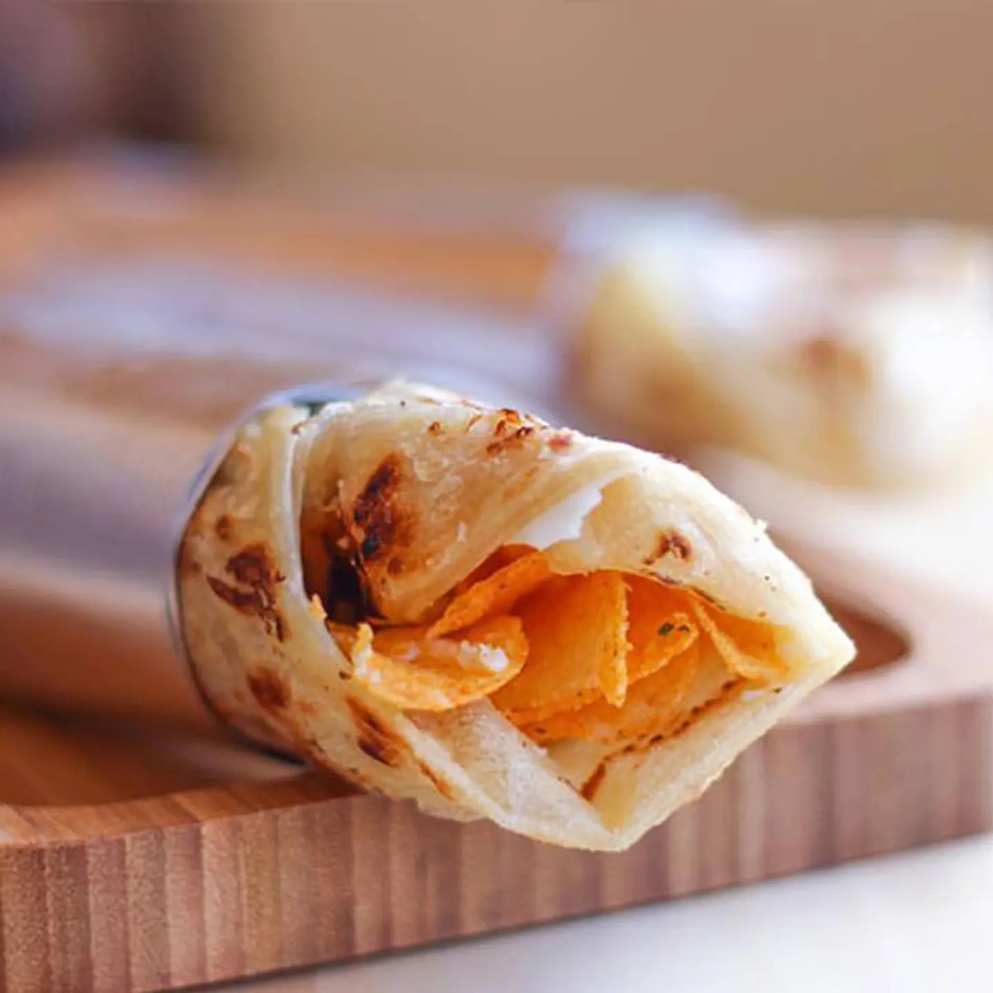 Salty Brown Chapati With Cheese & Omani Chips