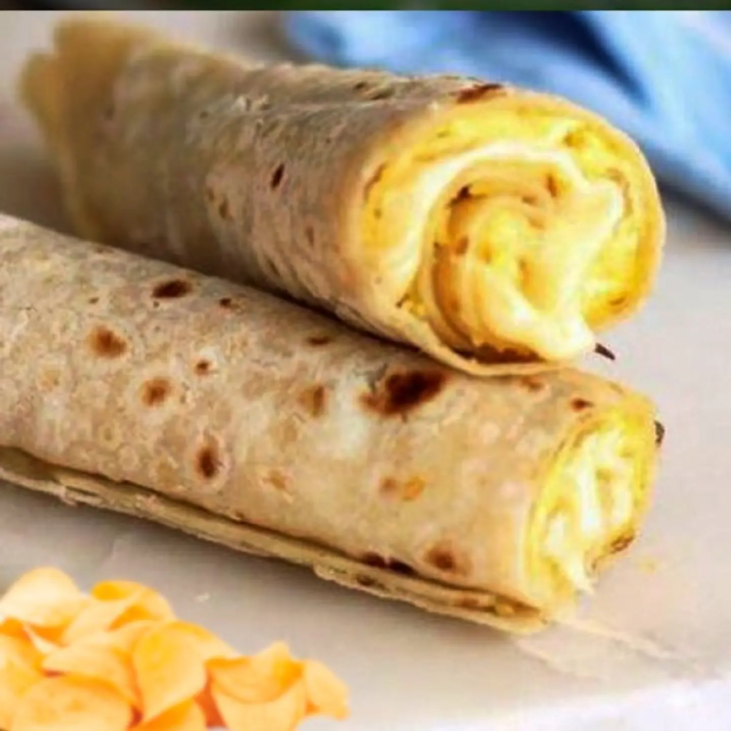 Salty Brown Chapati With Cheese, Eggs & Omani Chips
