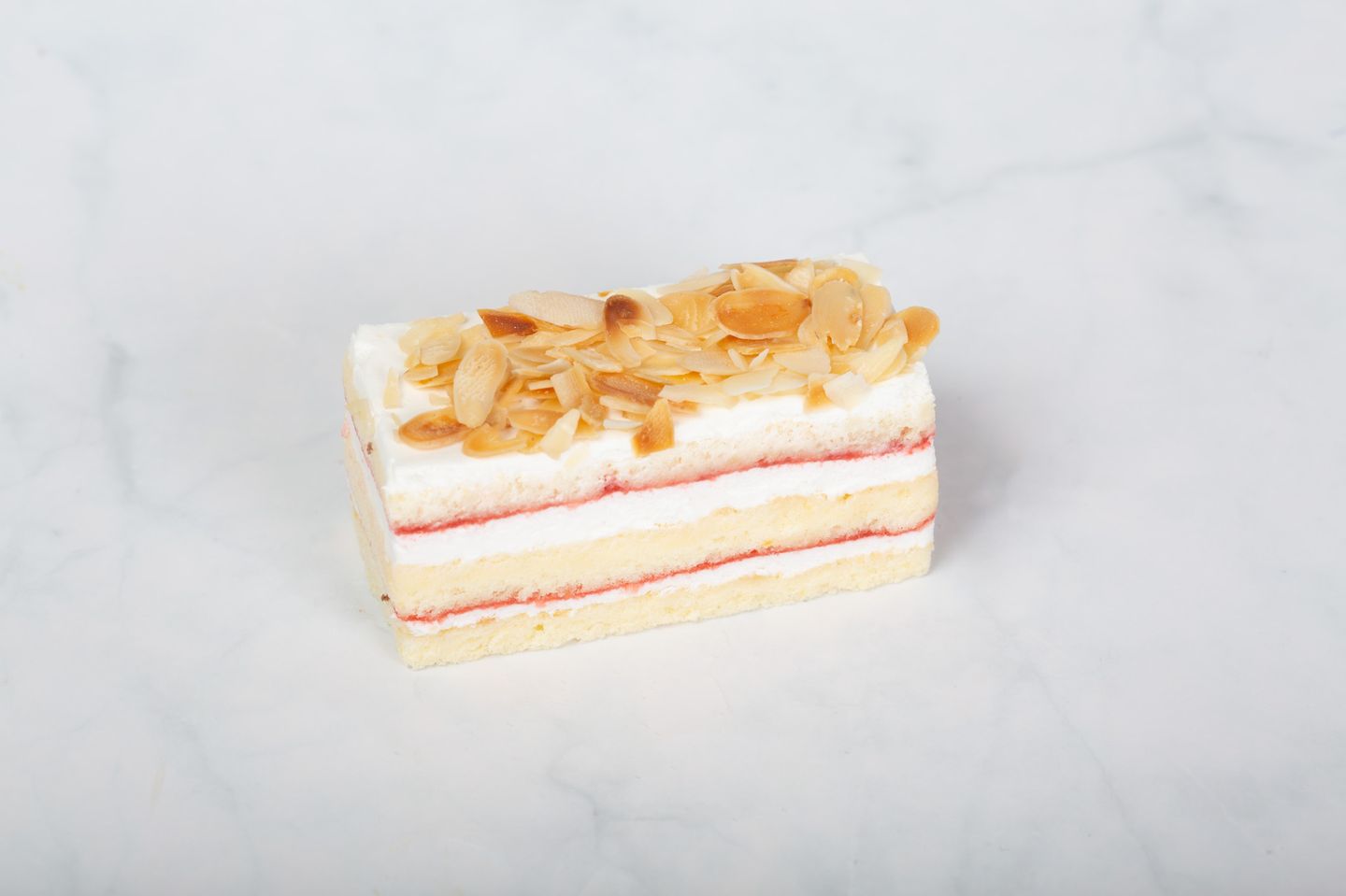 A Rectangular Piece Of Vanilla Cake