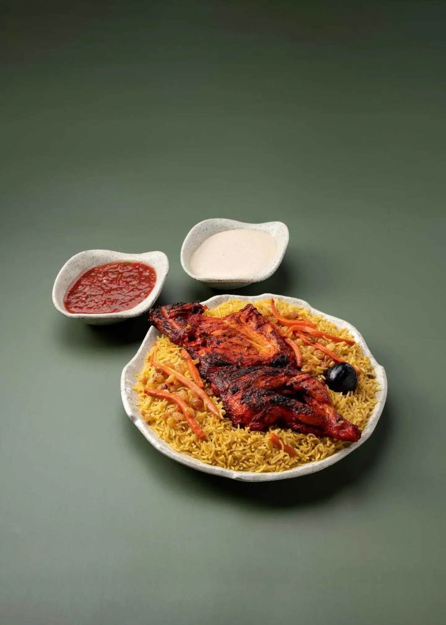 نصف دجاجة على الفحم مع أرز