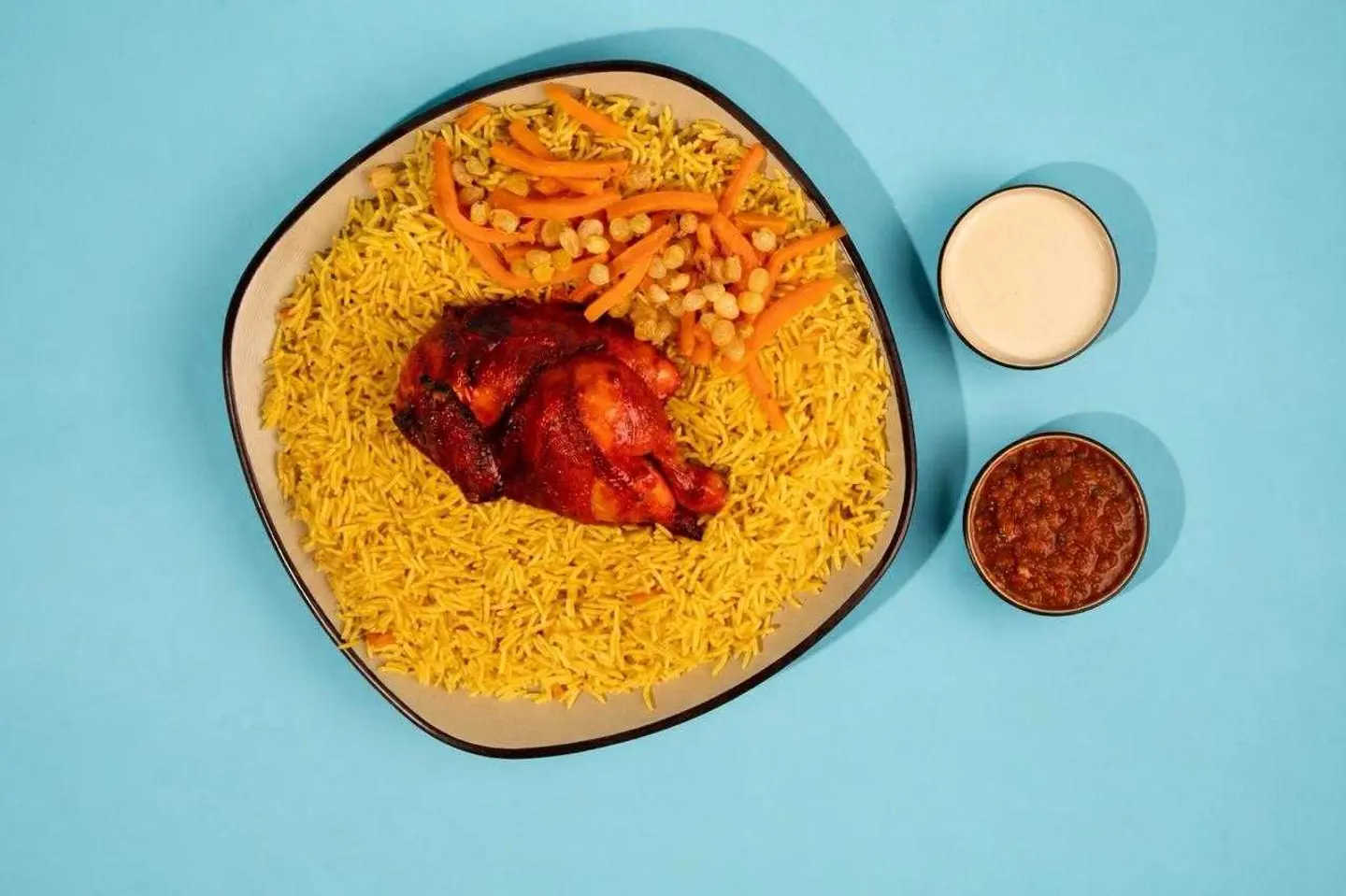 نصف دجاجة شواية مع أرز