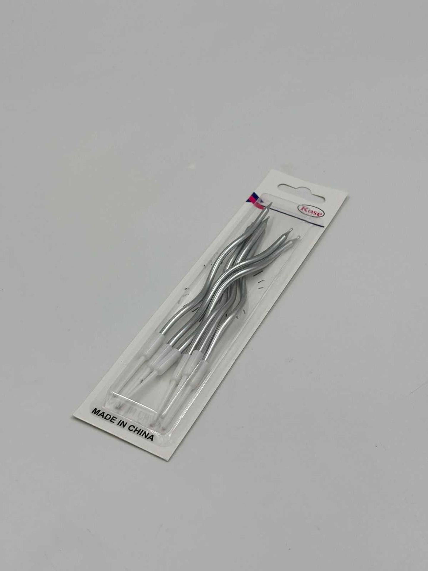 شموع ملتوية فضية