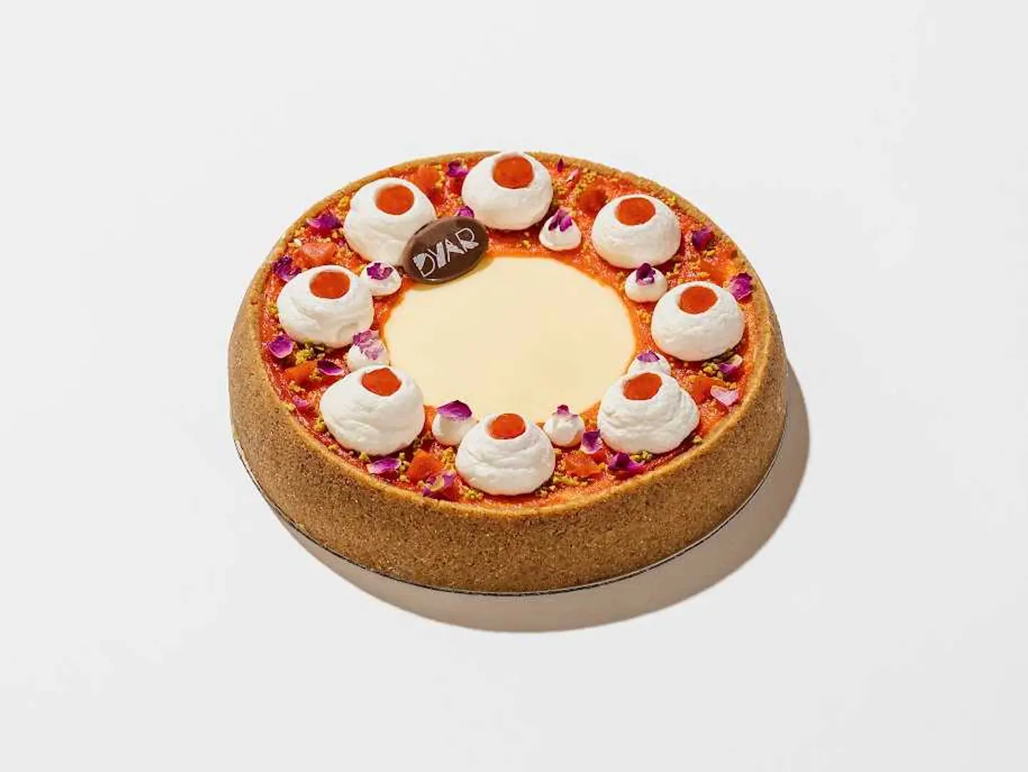 Cheesecake With Bahraini Sweets