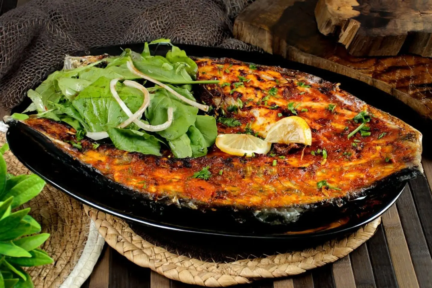 سمك سيباس مشوي ( طريقة الدفتر ) لشخصين