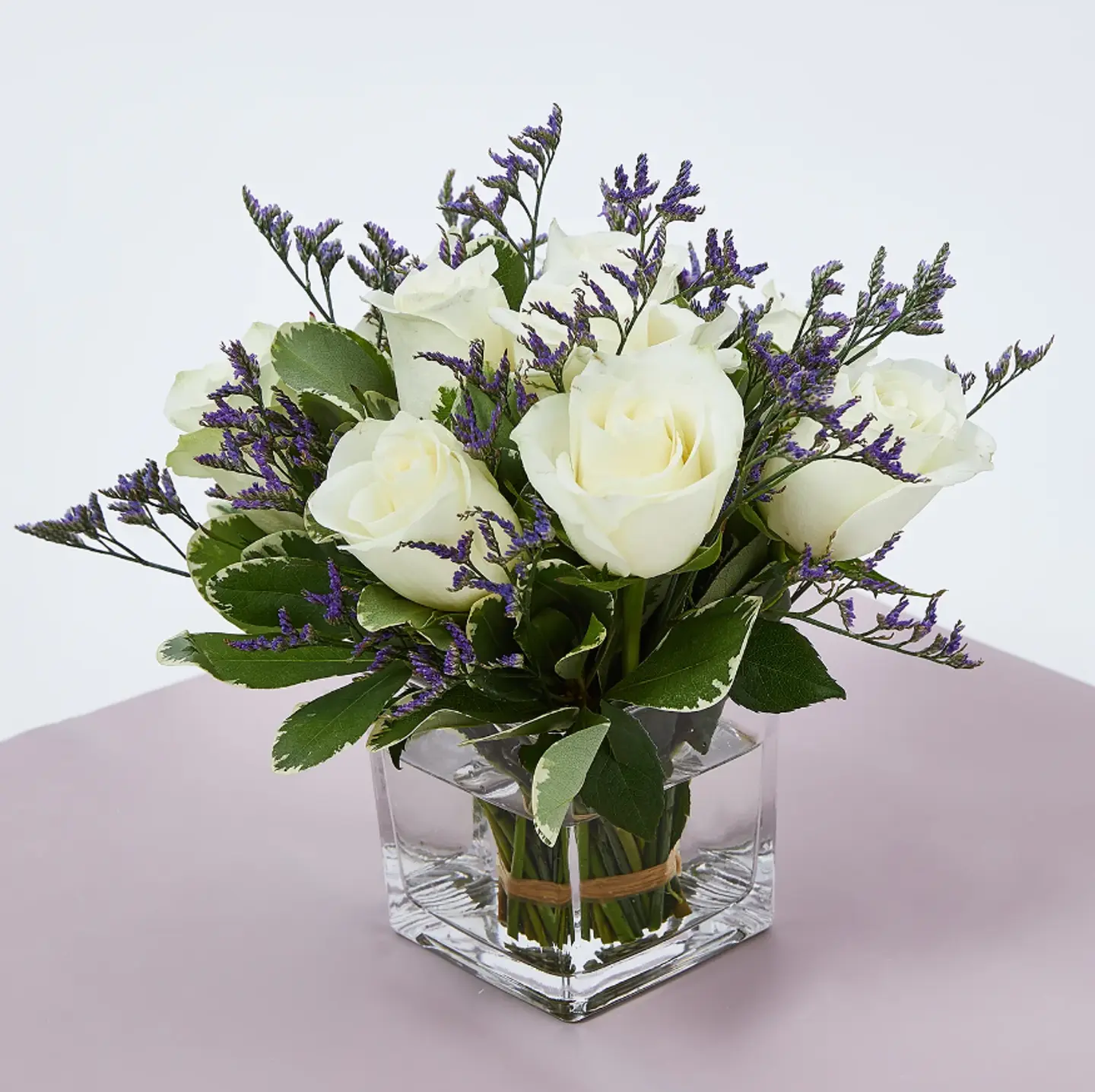 White Roses In A Vase
