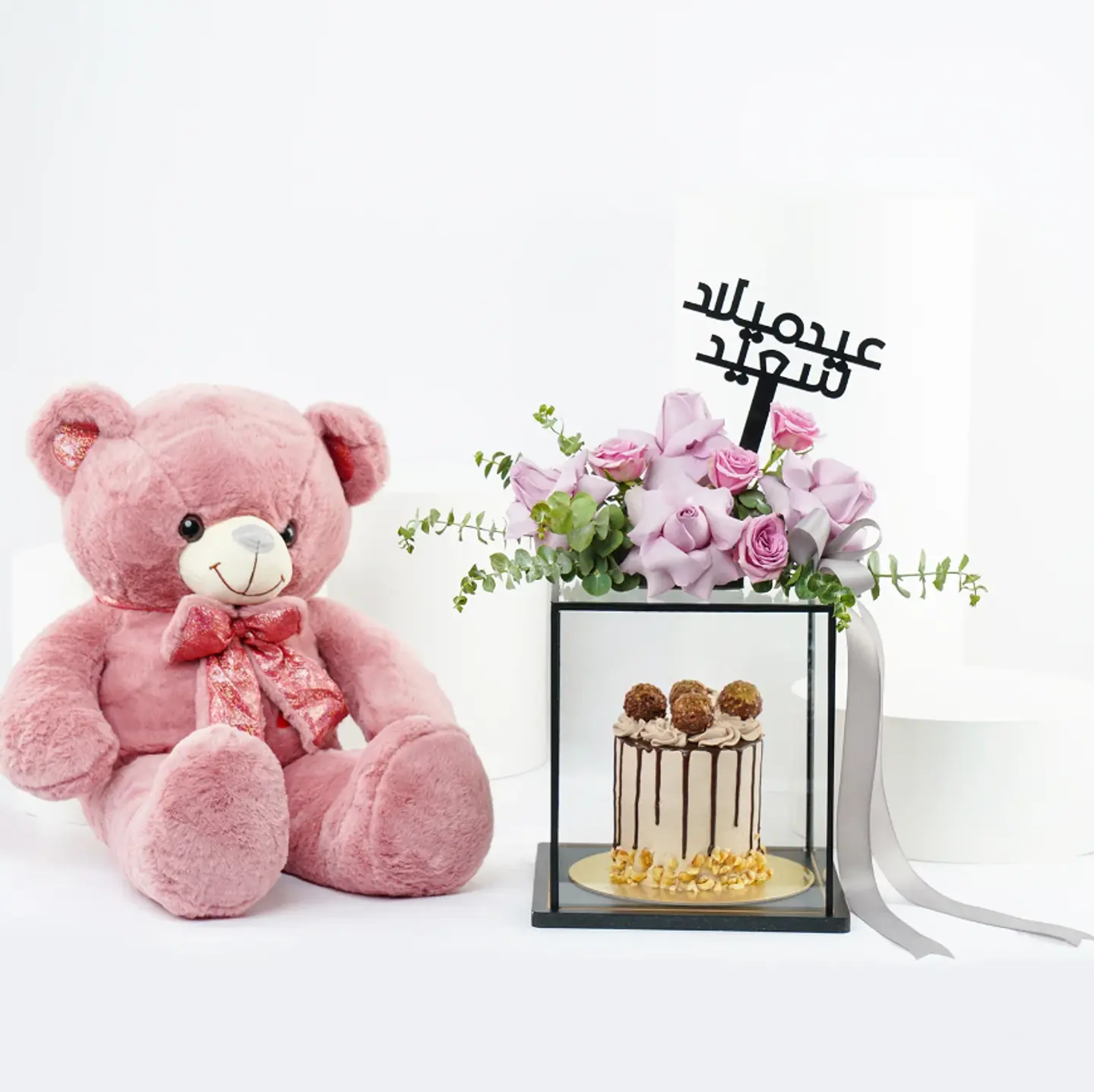 هدايا عيد ميلاد باقة ورد مع كيك فيريرو روشيه و دبدوب