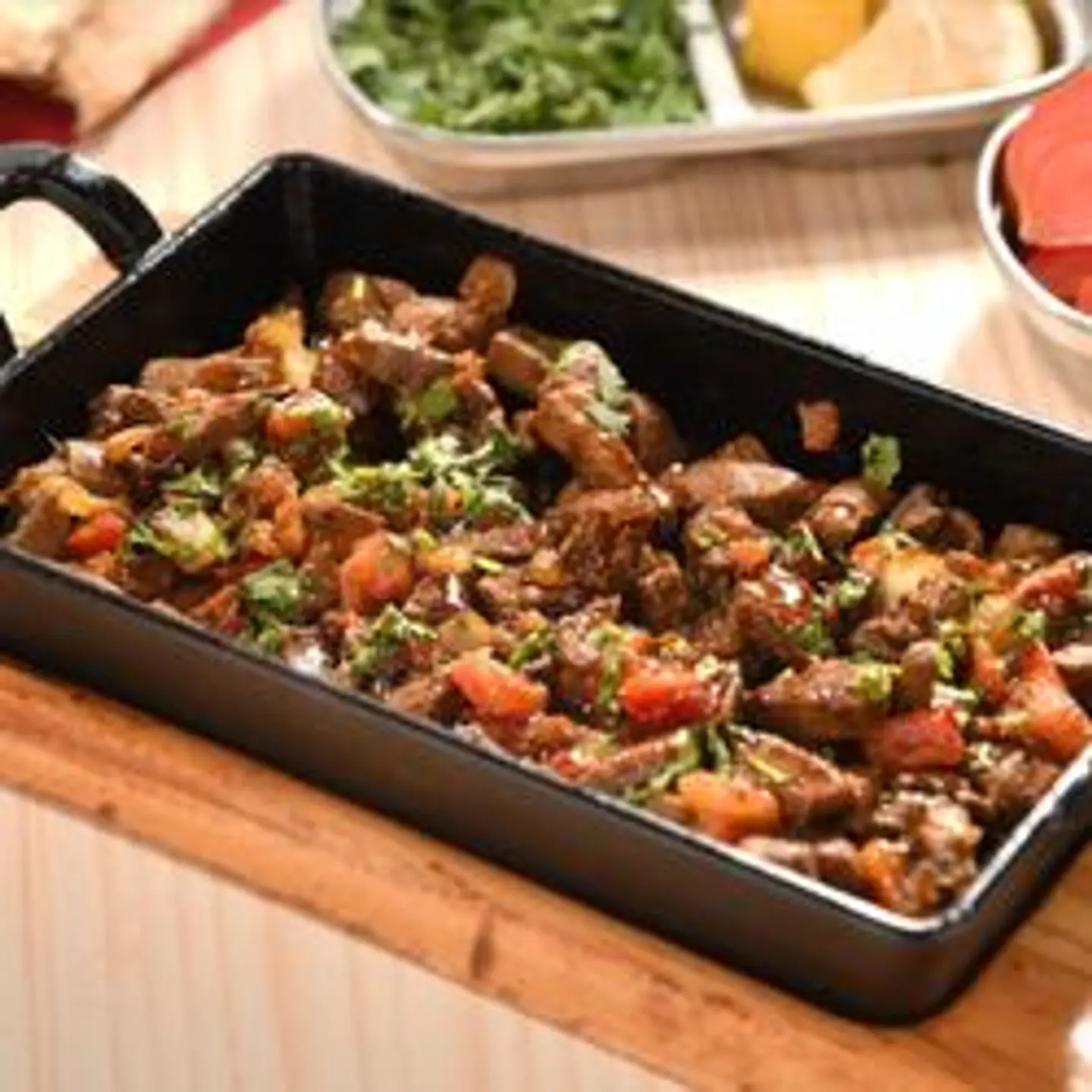 كبدة غنم مع دبس الرمان